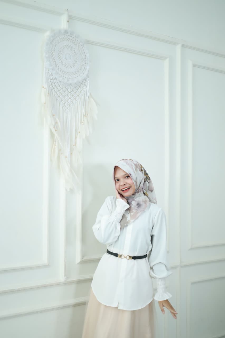 Risna Al Madini